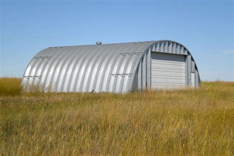 half circle metal house in woods|half circle metal walls.